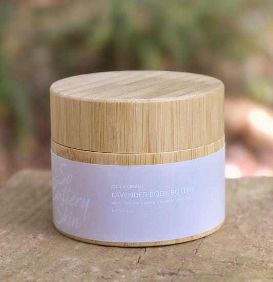 Whipped Lavender Body Butter texture in an open 3.4oz travel jar, shea and plant oils
