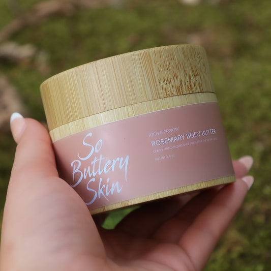 Whipped Rosemary Body Butter texture in an open 3.4oz travel jar, shea and plant oils