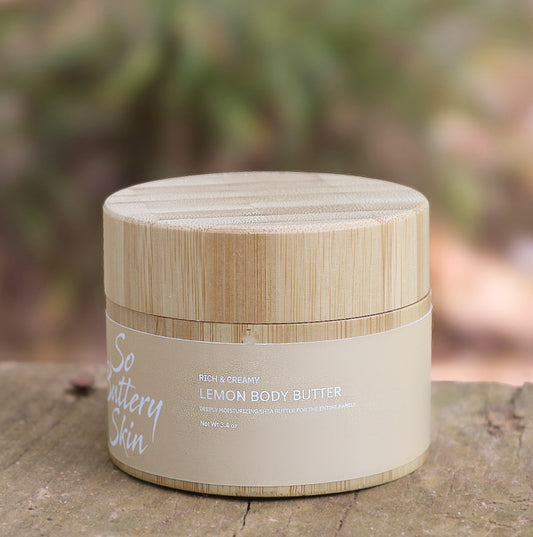 Whipped Lemon Body Butter texture in an open 3.4oz travel jar