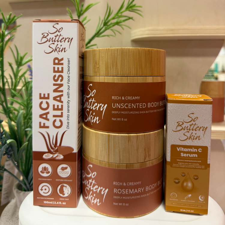 Collection of 'So Butterly Skin' skincare products including cleanser, body wash, and serum on a decorative surface.