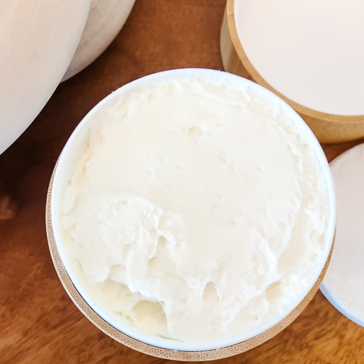 Open jar of Mystic Oud Body Butter with rich, whipped texture