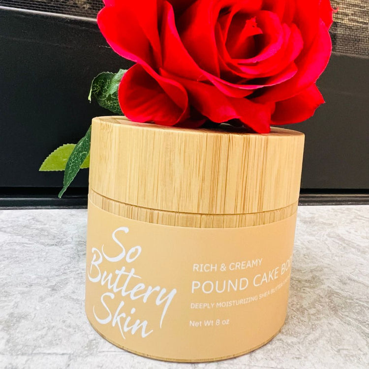 Whipped shea butter with creamy texture in open jar labeled Pound Cake
