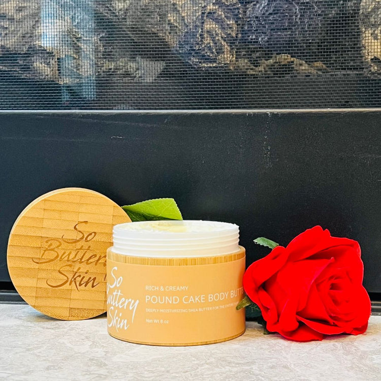 Whipped shea butter with creamy texture in open jar labeled Pound Cake