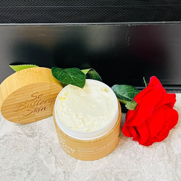 Whipped shea butter with creamy texture in open jar labeled Pound Cake
