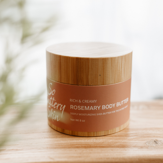 Jar of plant-based rosemary body butter on a wooden tray