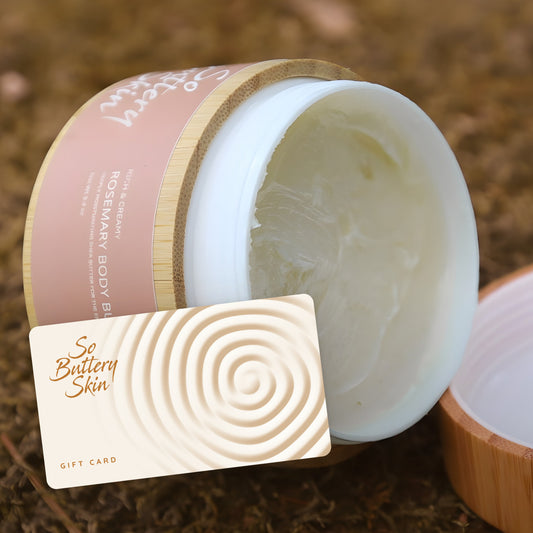 So Buttery Skin gift card resting against an open jar of Rosemary Body Butter