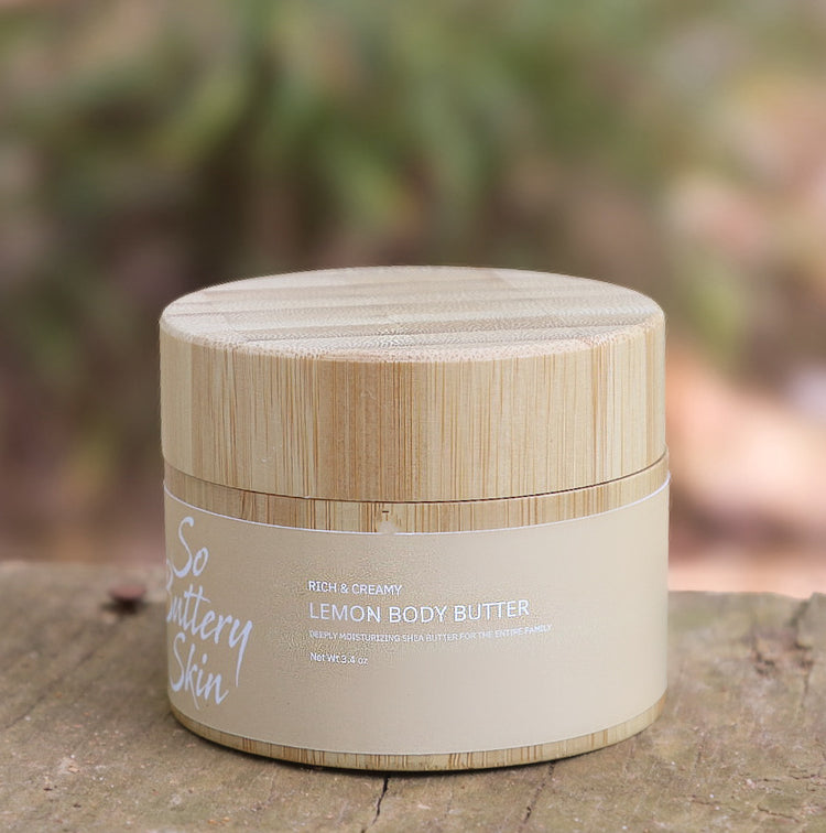Whipped Lemon Body Butter texture in an open 3.4oz travel jar
