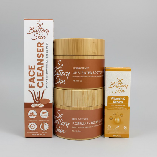 Collection of 'So Butterly Skin' skincare products including cleanser, body wash, and serum on a white surface with a plant in the background.