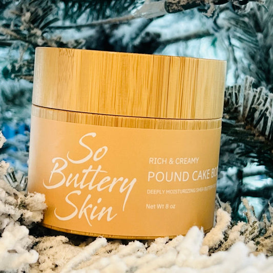 Whipped shea butter with creamy texture in open jar labeled Pound Cake