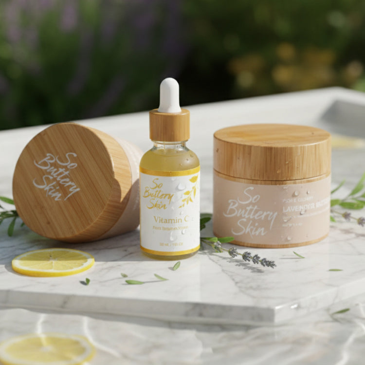 Skincare products from 'So Buttery Skin' on a marble surface with a blurred natural background